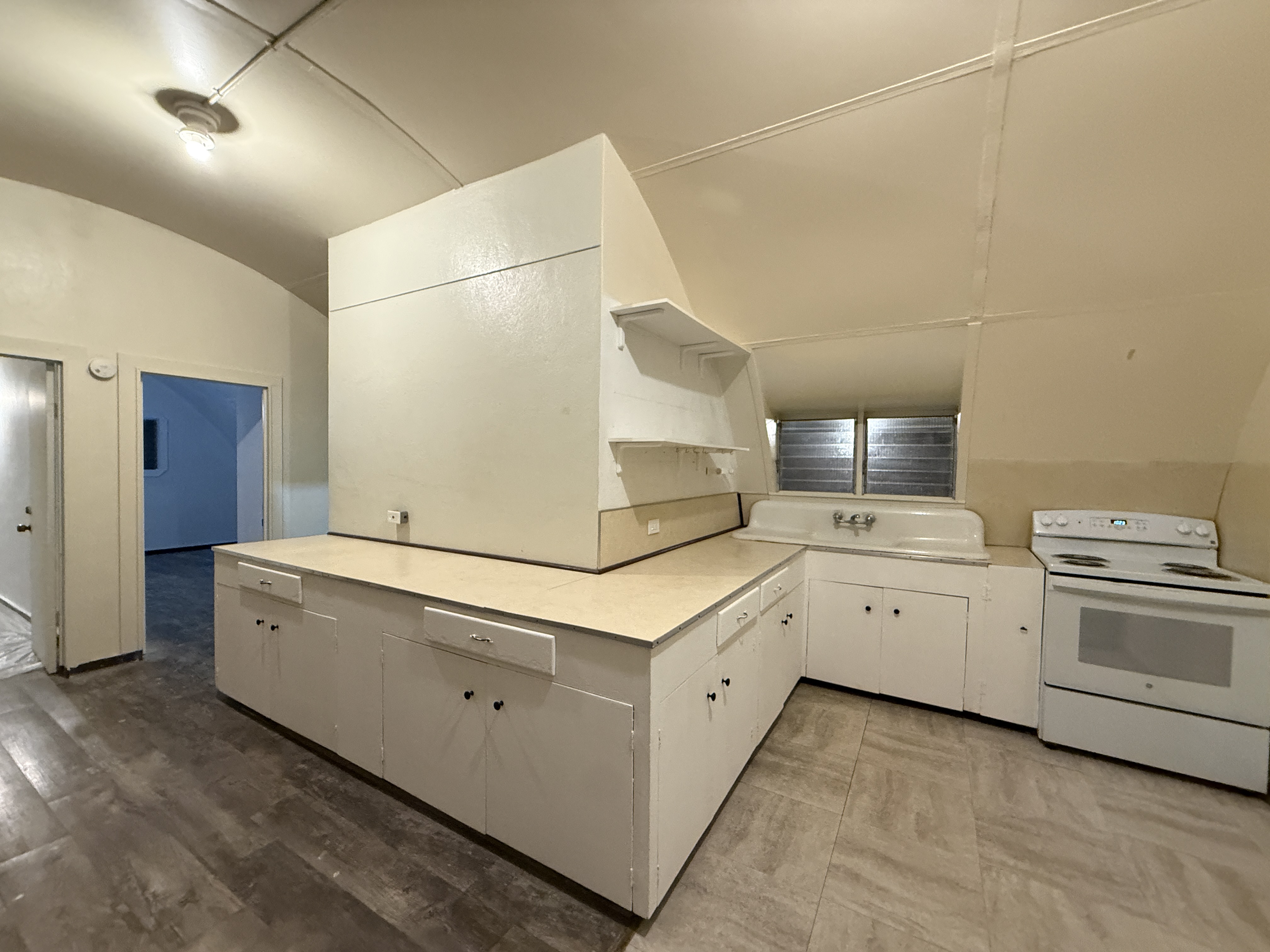 Kitchen cabinets after painting — fresh clean white finish