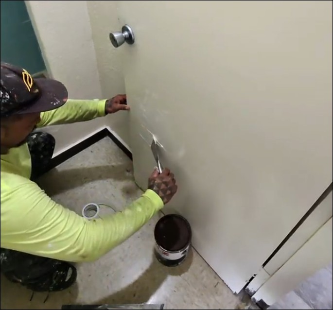AK247 handyman patching and repairing drywall